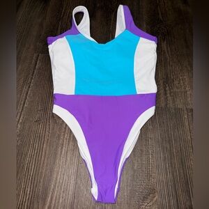 93 Play Street High Leg One Piece